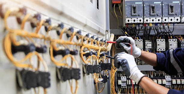 Professional Electrical Panel Upgrade technician working in Wilbarger County County, TX